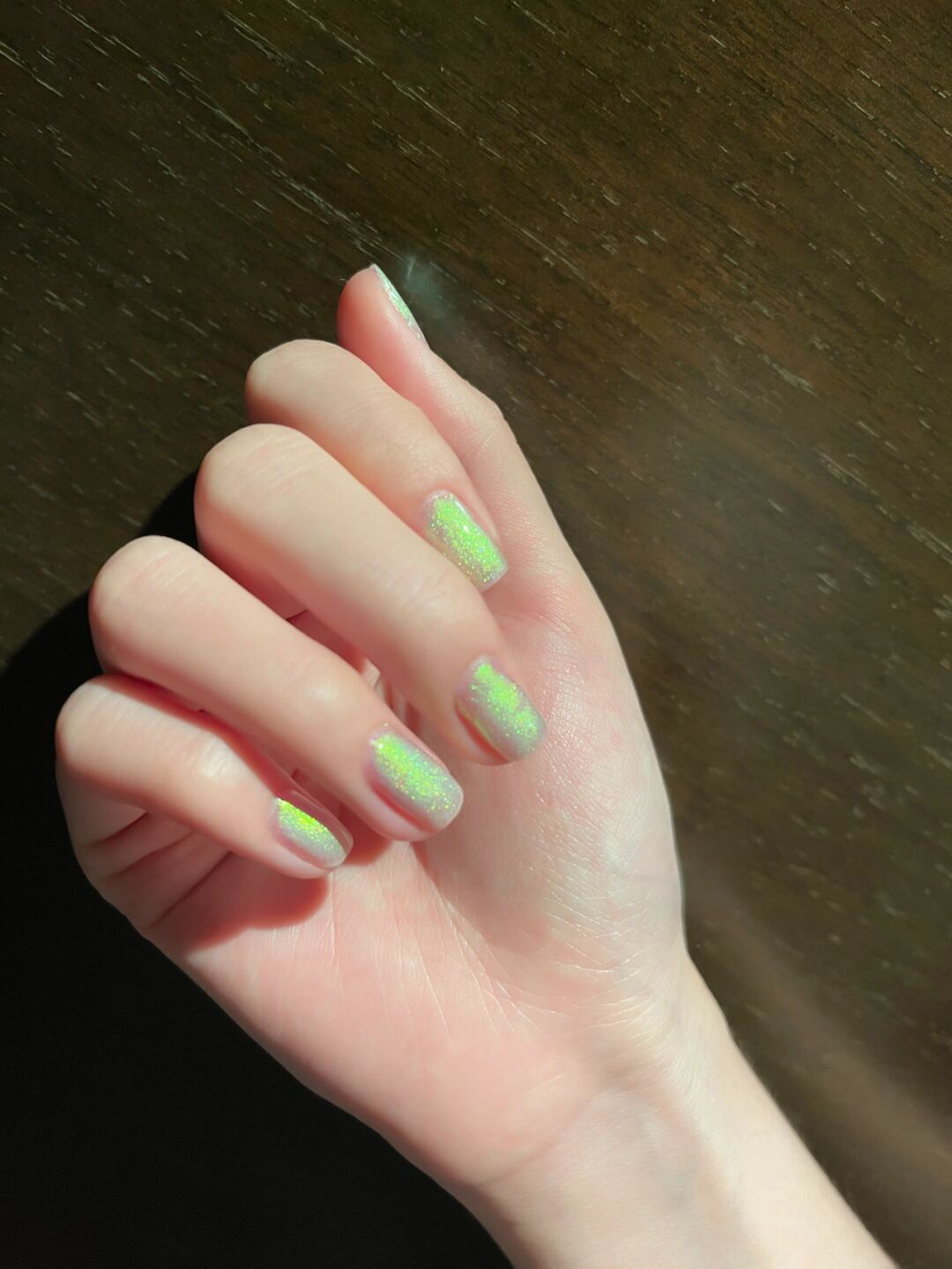 Green Glitter Short Square Nails shown as a nail art design with green, glitter, square and short details.