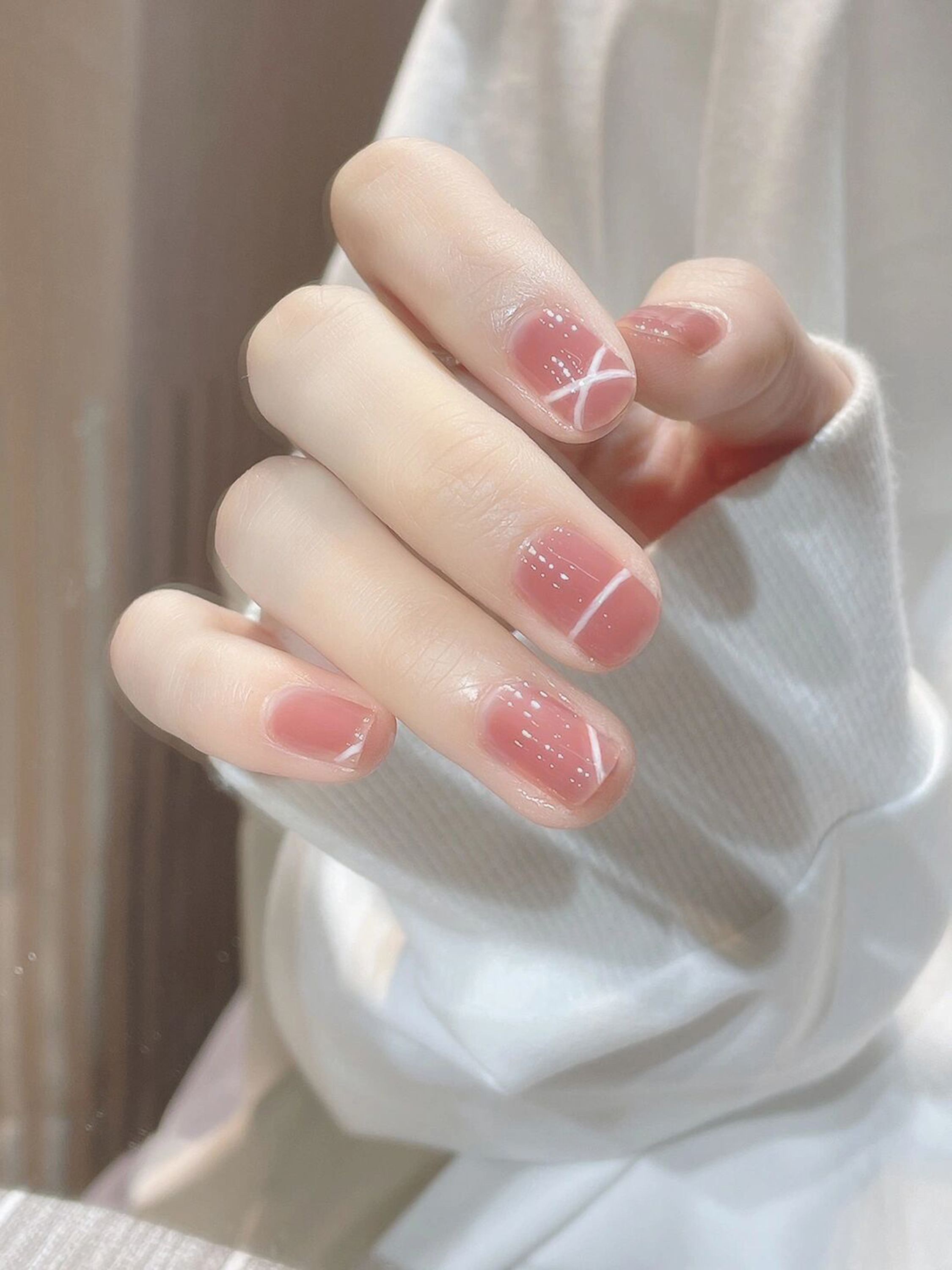 Pink and White Minimal Short Round Nails shown as a nail art design with pink, white, simple, minimal, round and short details.