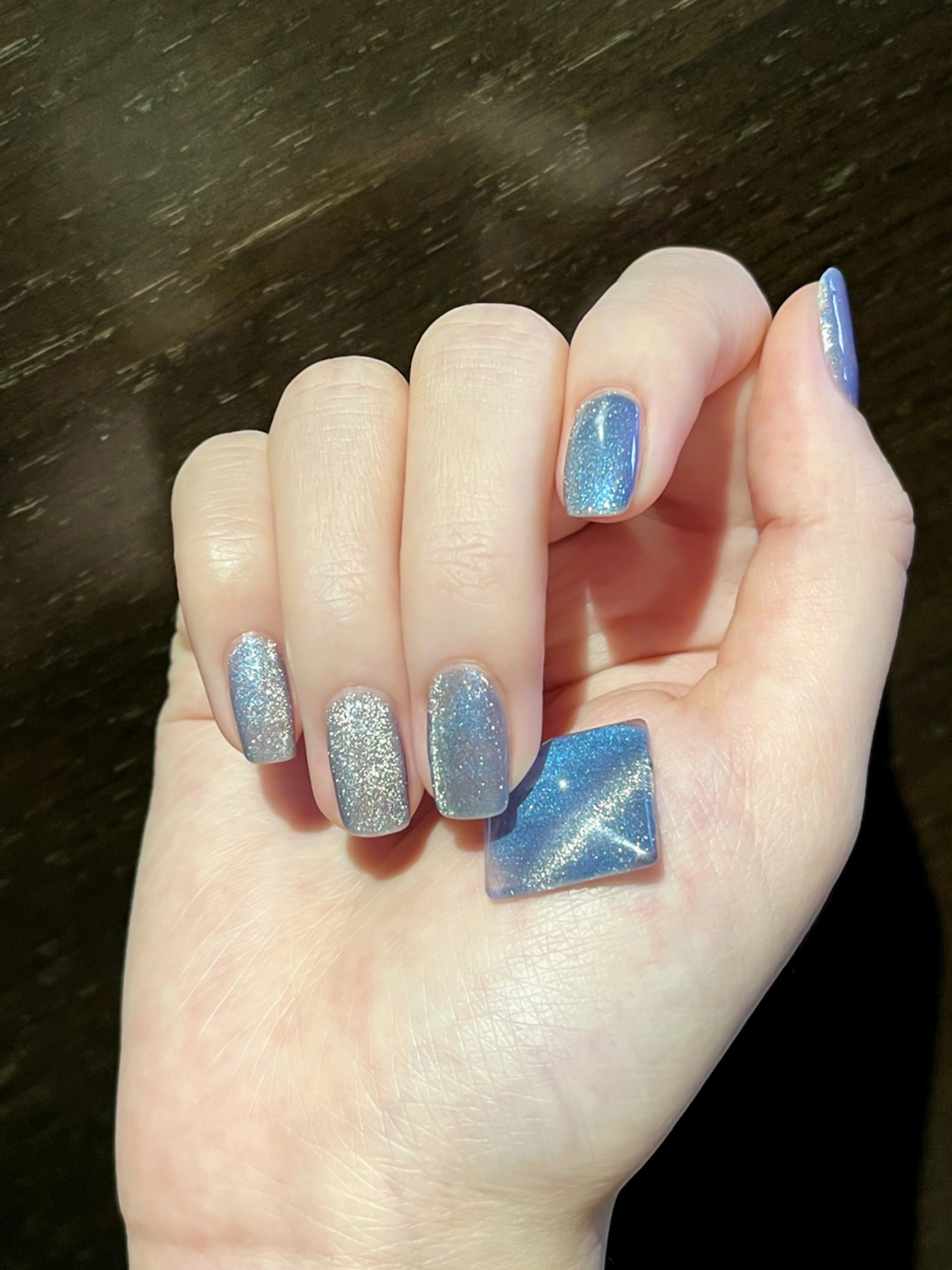 Silver and Blue Glitter Square Nails shown as a nail art design with silver, blue, glitter, square and medium details.
