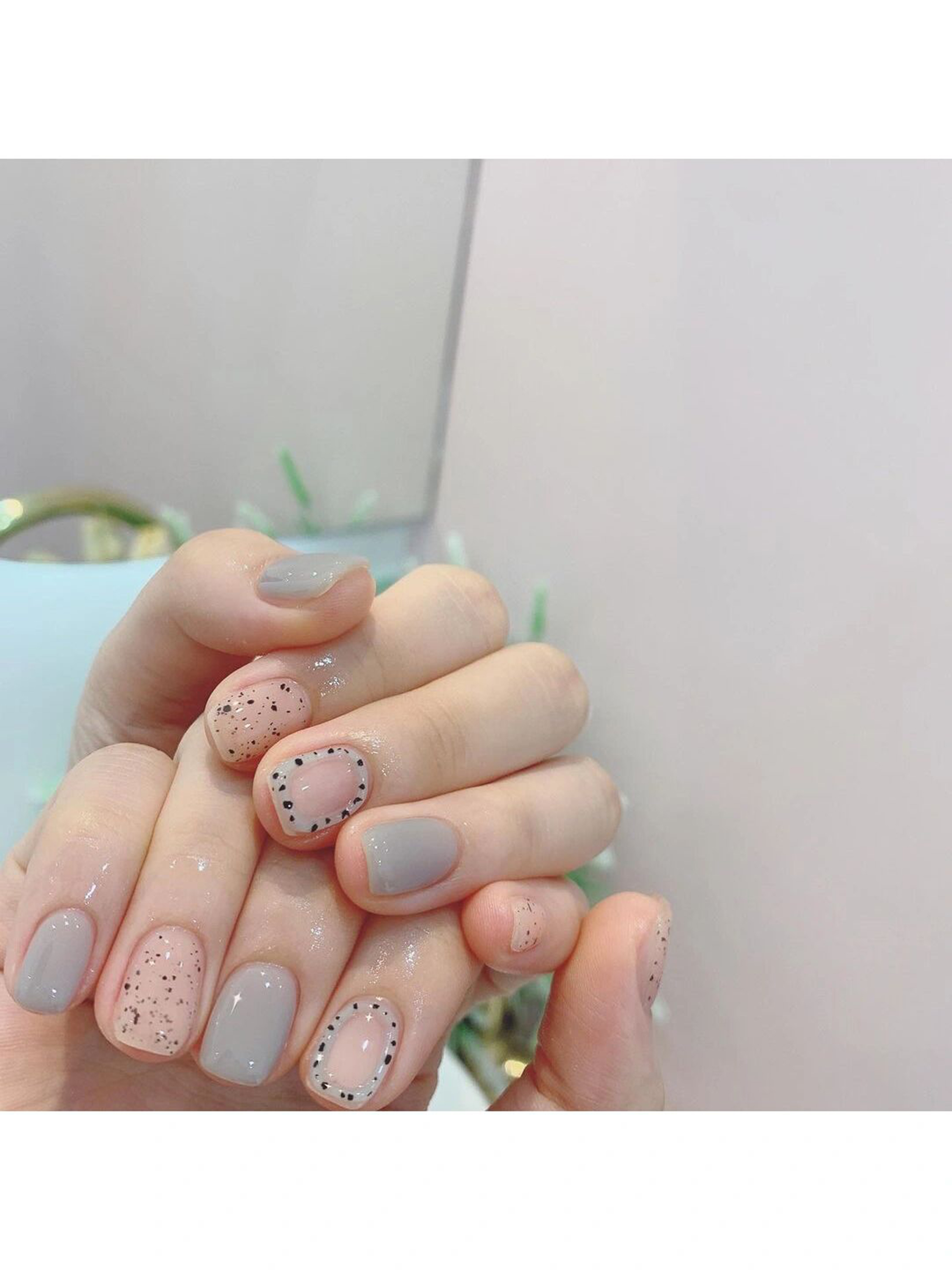 Pastel Polka Dot Short Round Nails shown as a nail art design with pastel, cute, polka dot, round and short details.
