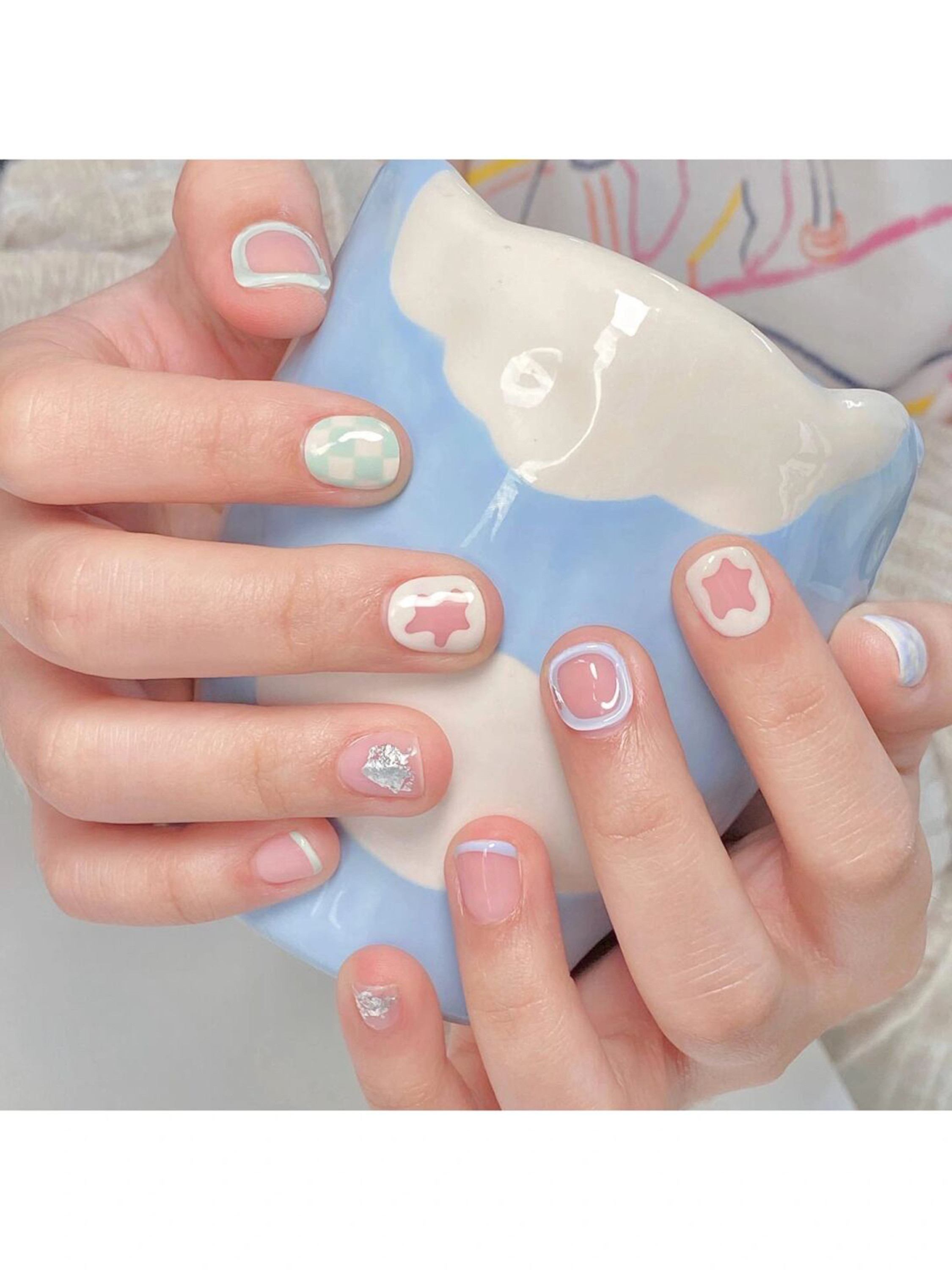 Pastel Bow Short Square Nails shown as a nail art design with pastel, coquette, cute, bow, square and short details.