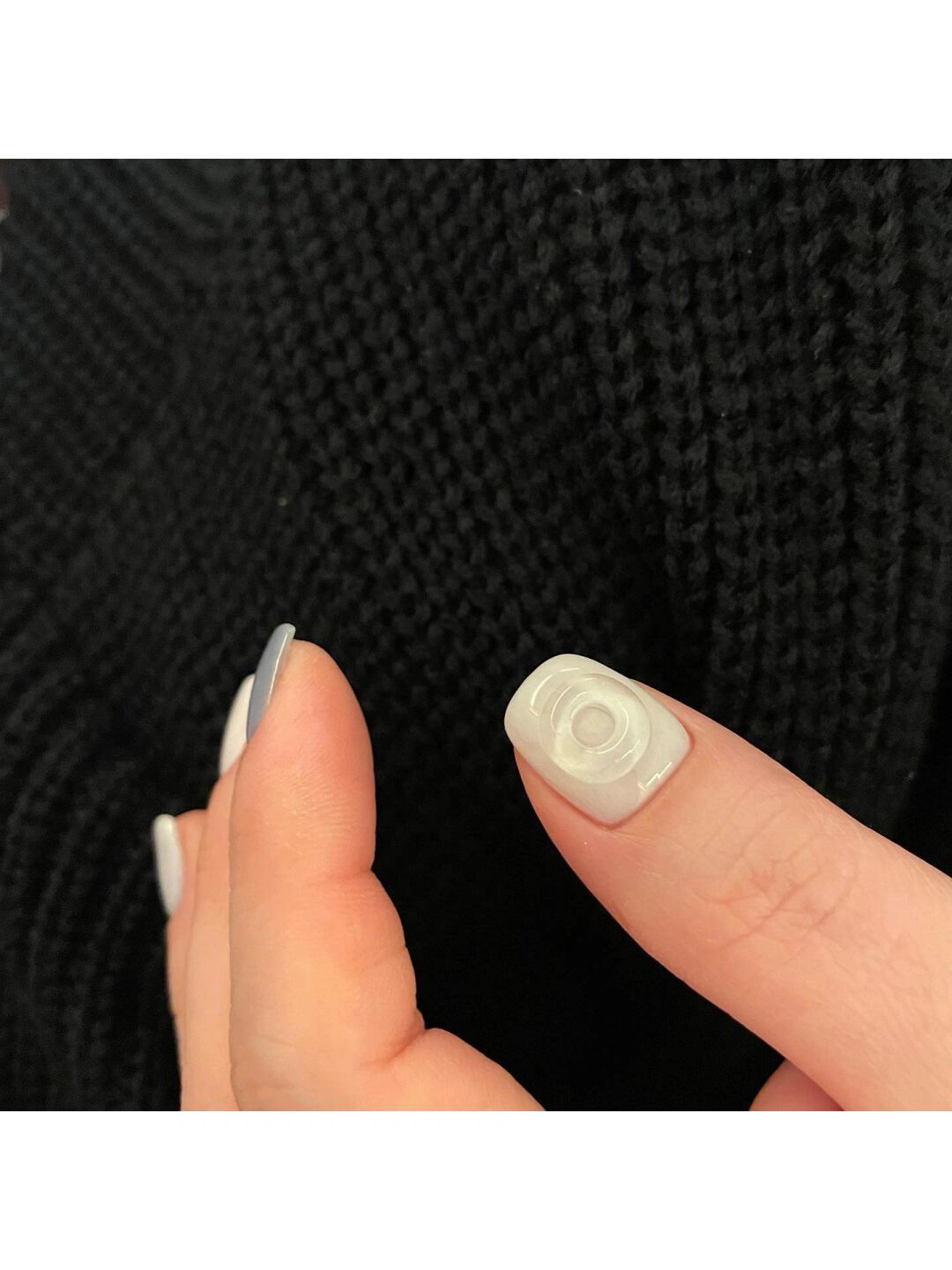 Nude and White 3D Short Round Nails shown as a nail art design with nude, white, 3d, minimal, round and short details.