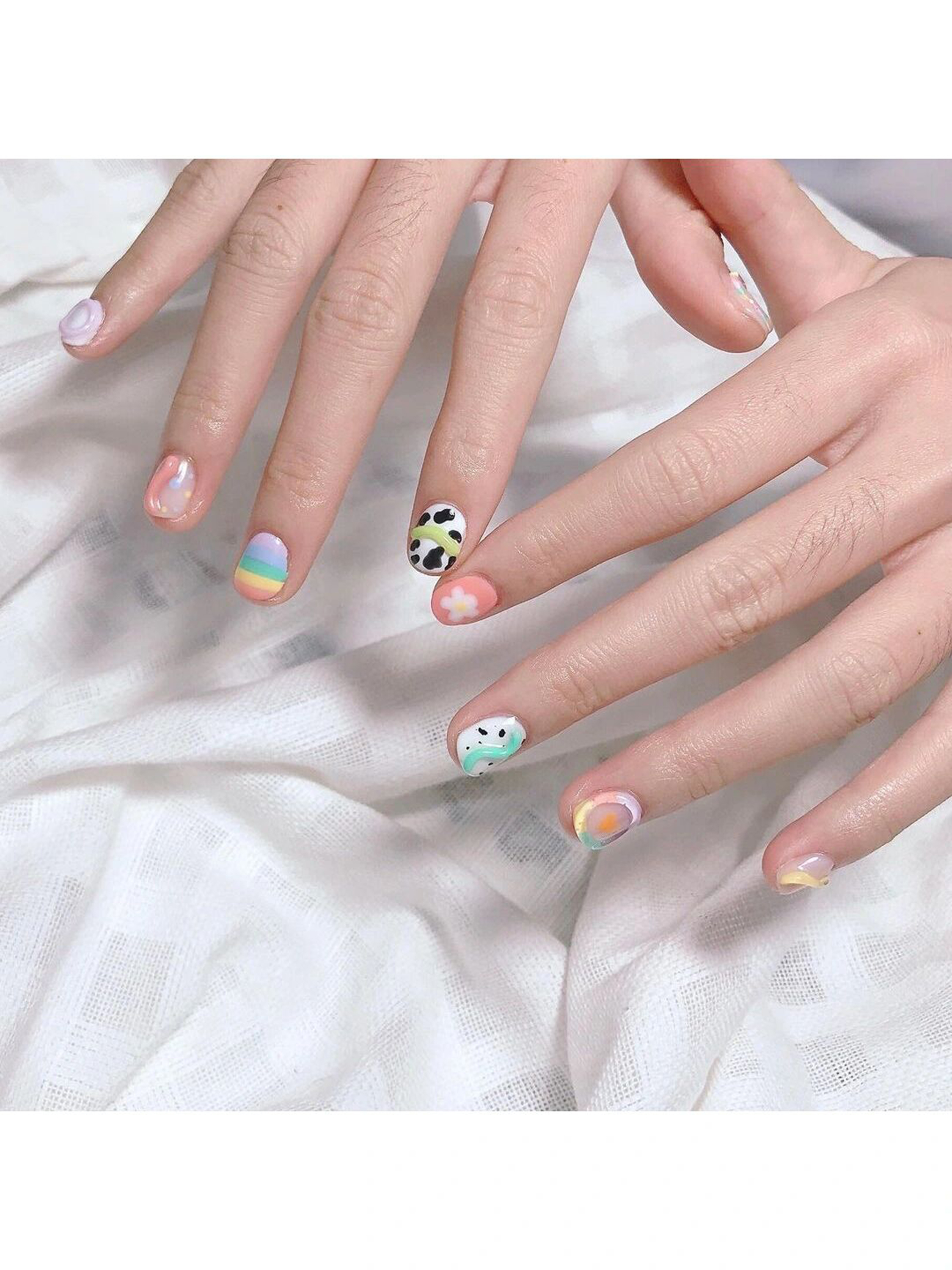 White, Pink and Blue Checkerboard Short Square Nails shown as a nail art design with white, pink, blue, cute, gel, flower, checkerboard, square and short details.