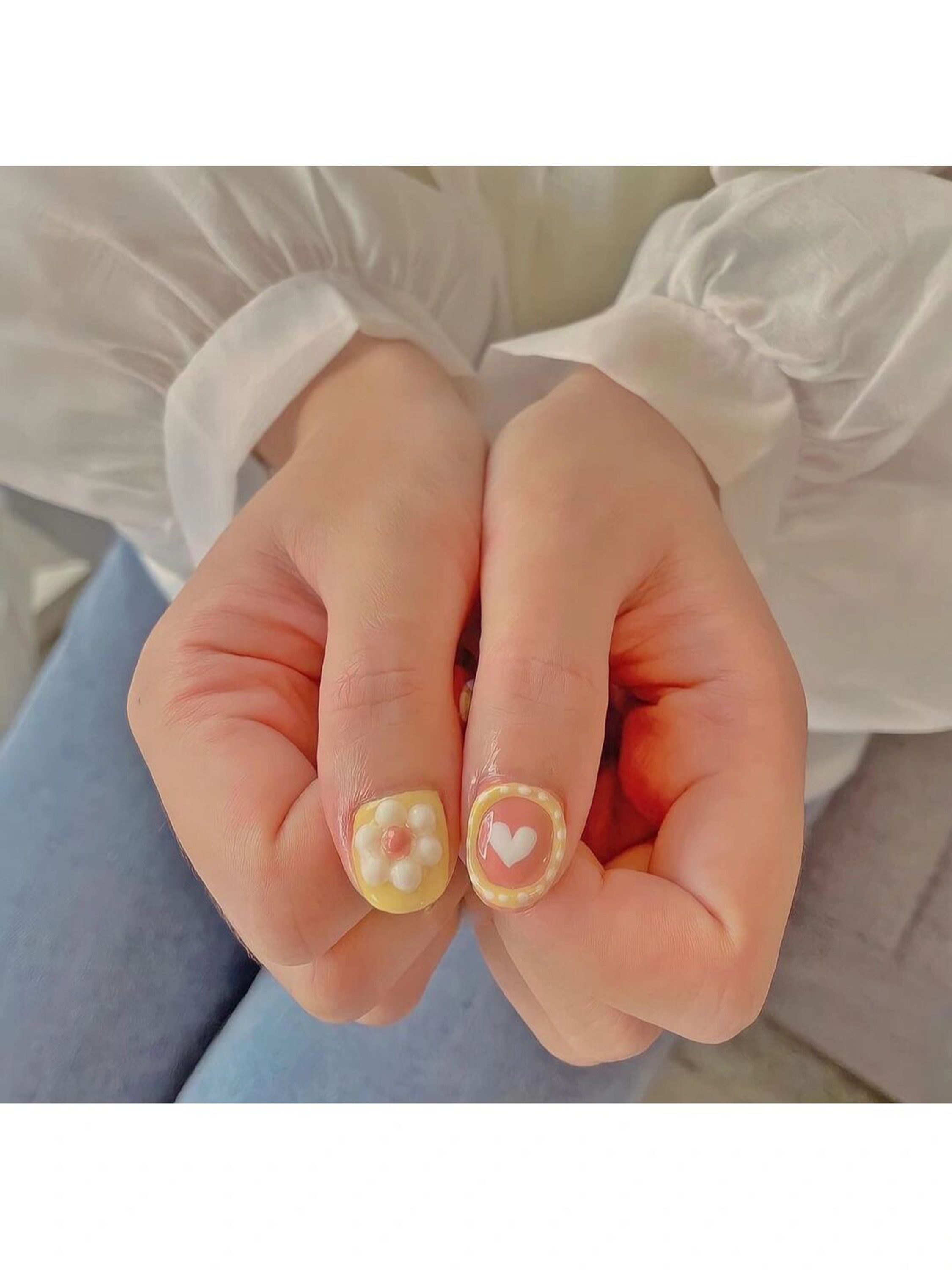 Nude Heart Short Round Nails shown as a nail art design with nude, cute, minimal, heart, round and short details.