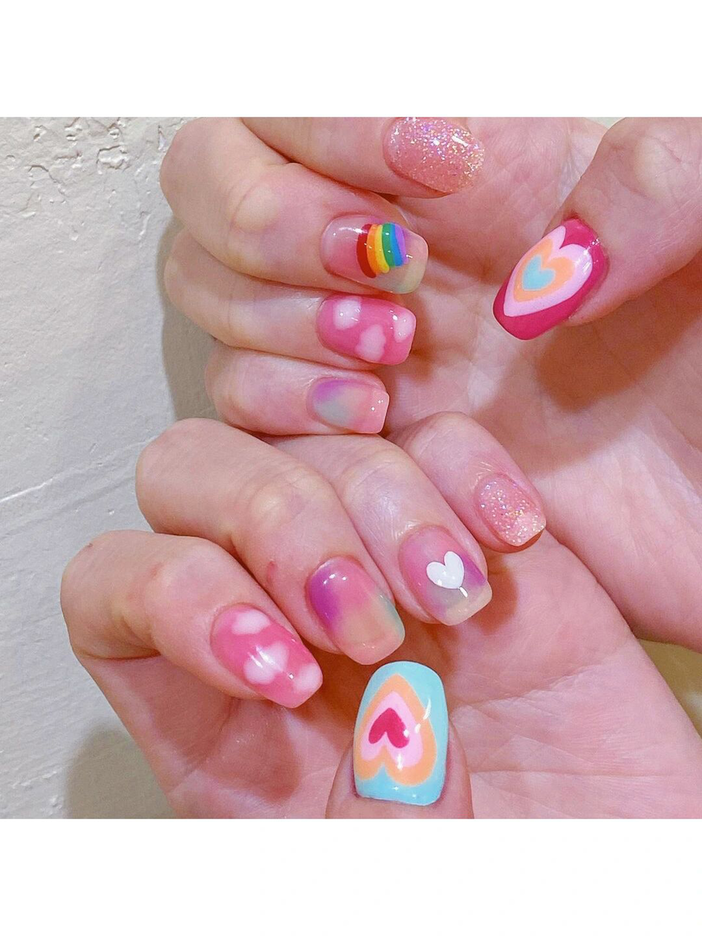 Pink and Blue Heart Square Nails shown as a nail art design with pink, blue, cute, aesthetic, glitter, heart, square and medium details.