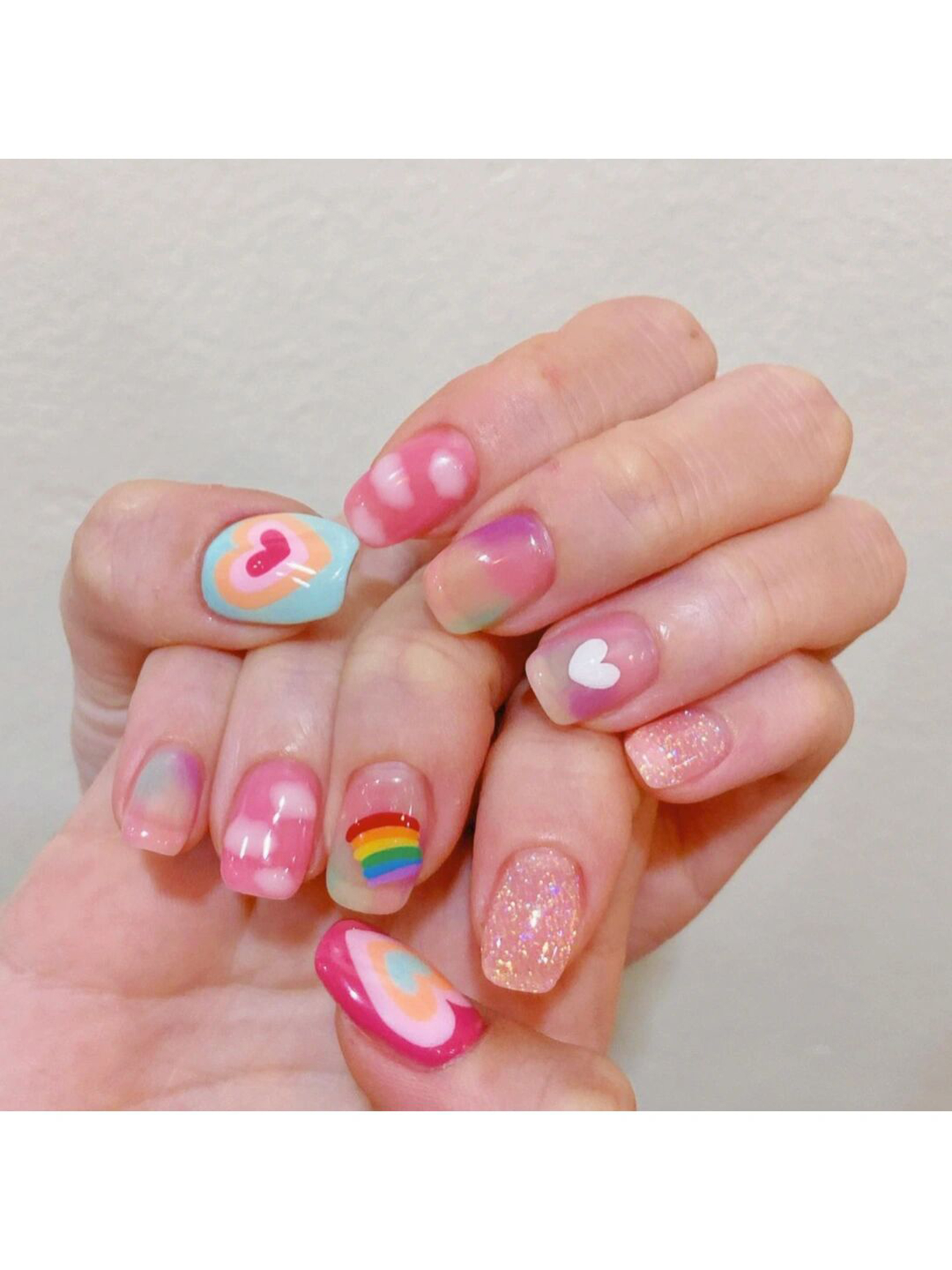 Pink and Baby Blue Heart Square Nails shown as a nail art design with pink, baby blue, cute, glitter, heart, square and medium details.