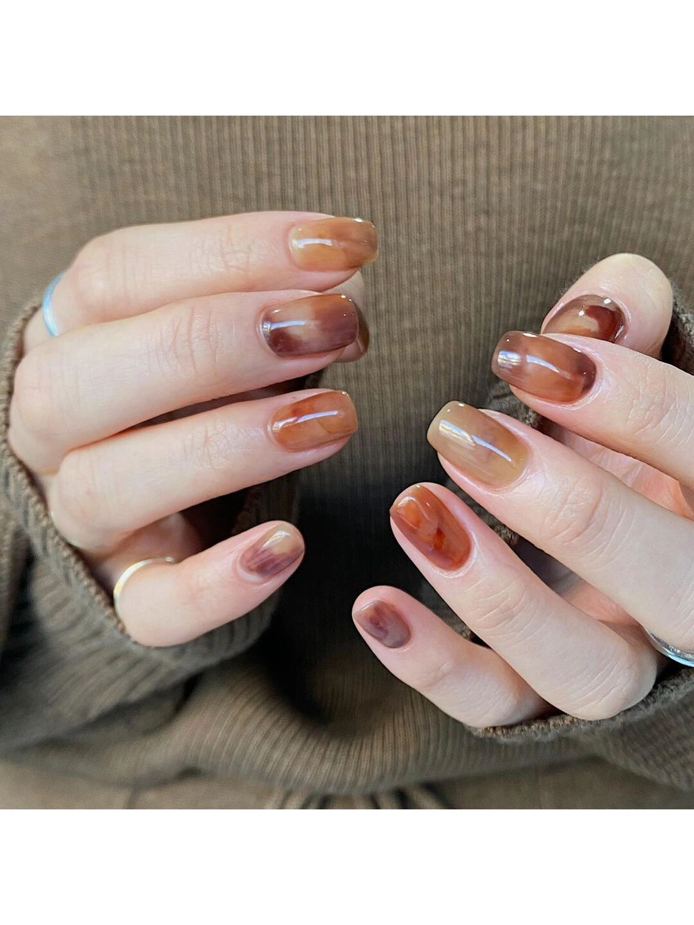 Brown Abstract Square Nails shown as a nail art design with brown, marble, swirl, wave, square and medium details.