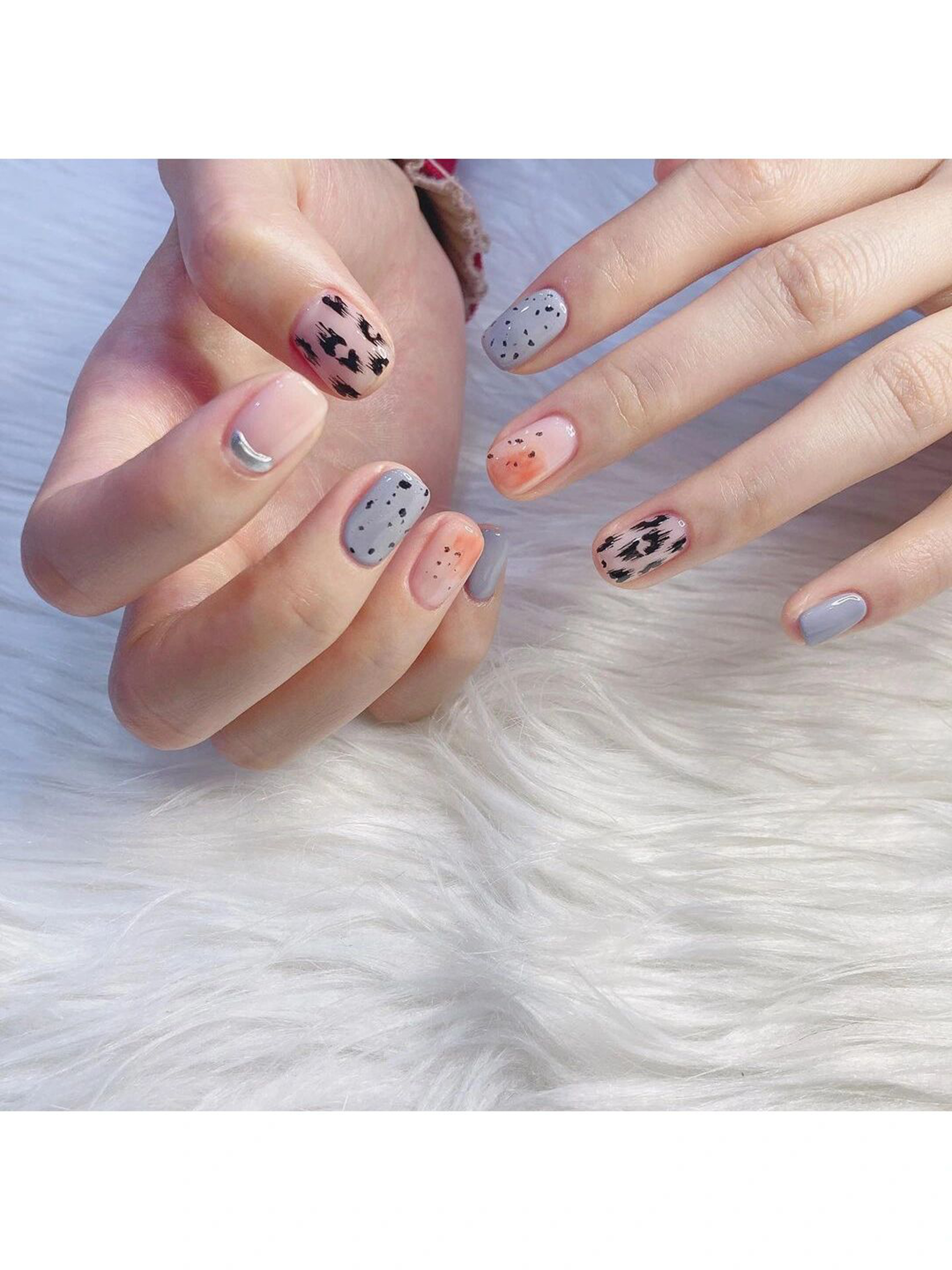 Pink, Gray and Black Polka Dot Short Round Nails shown as a nail art design with pink, gray, black, cute, simple, polka dot, animal print, round and short details.