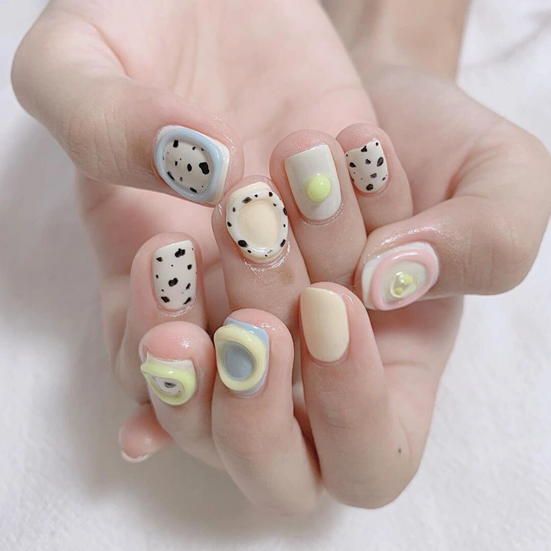 Black and White Polka Dot Short Square Nails shown as a nail art design with black, white, abstract, cute, polka dot, square and short details.