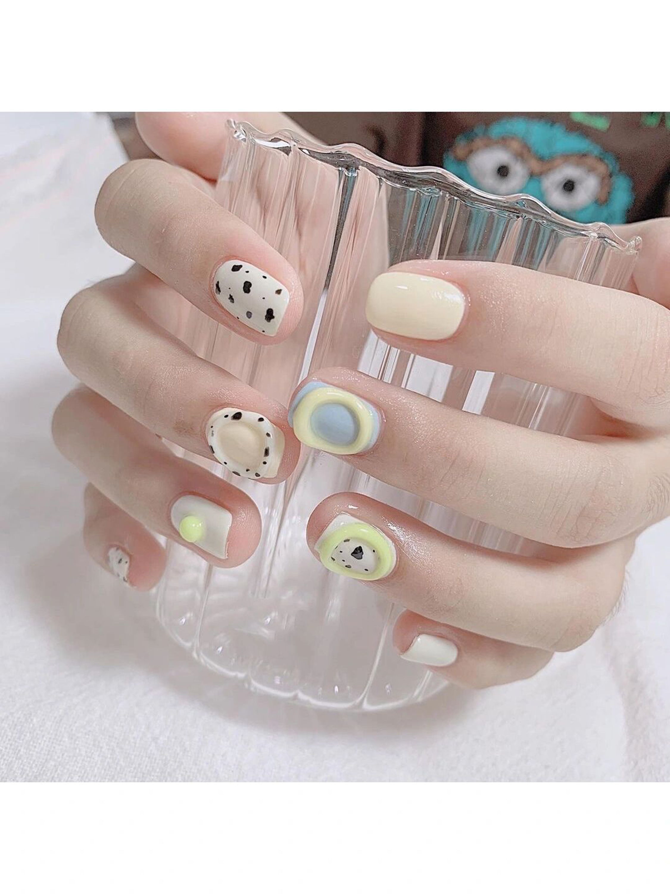 Pastel, Butter Yellow and Baby Blue Polka Dot Short Round Nails shown as a nail art design with pastel, butter yellow, baby blue, cute, abstract, aesthetic, polka dot, round and short details.