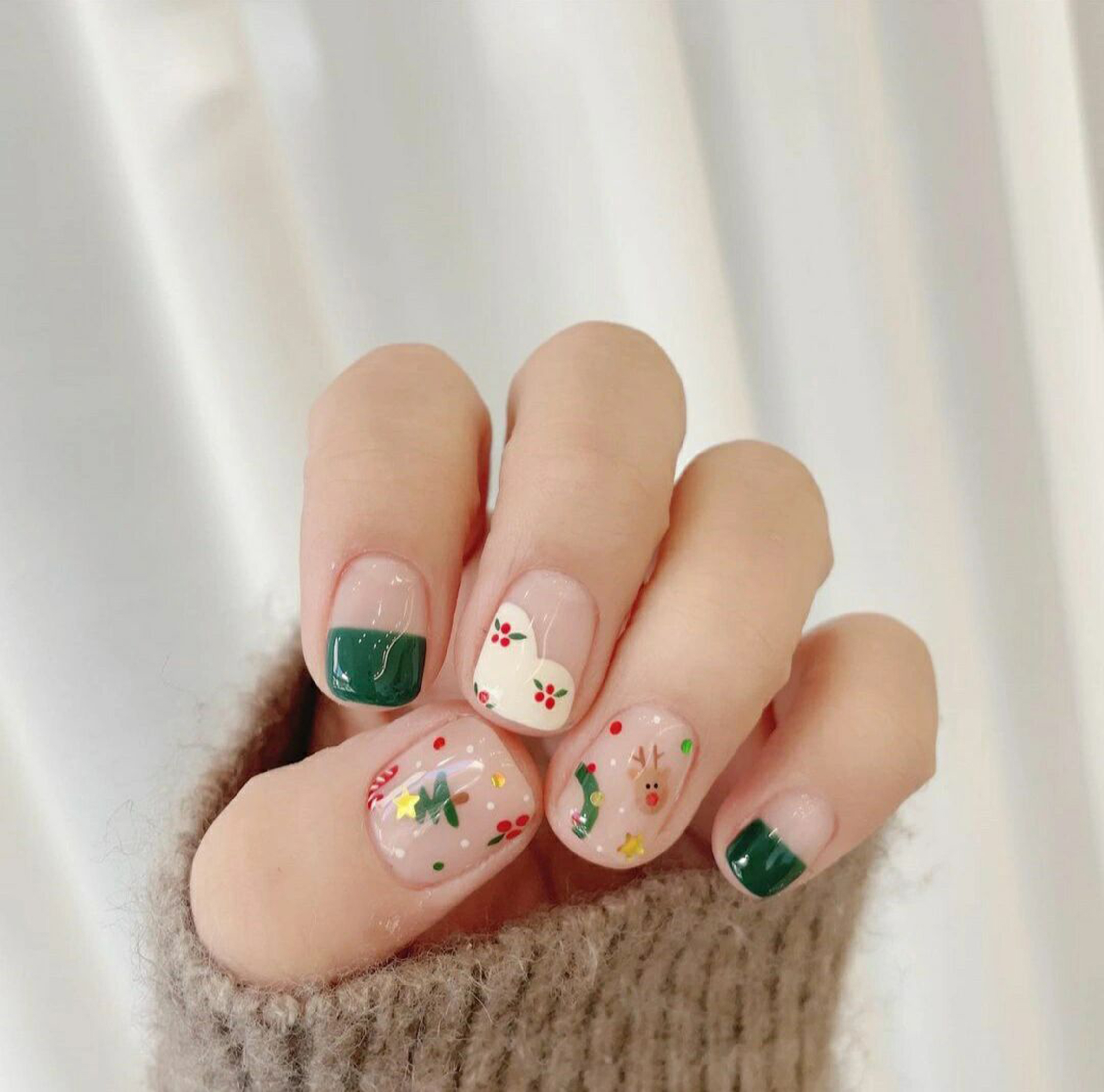 Green, Red and White Heart Short Square Nails shown as a nail art design with green, red, white, cute, french, heart, square and short details.