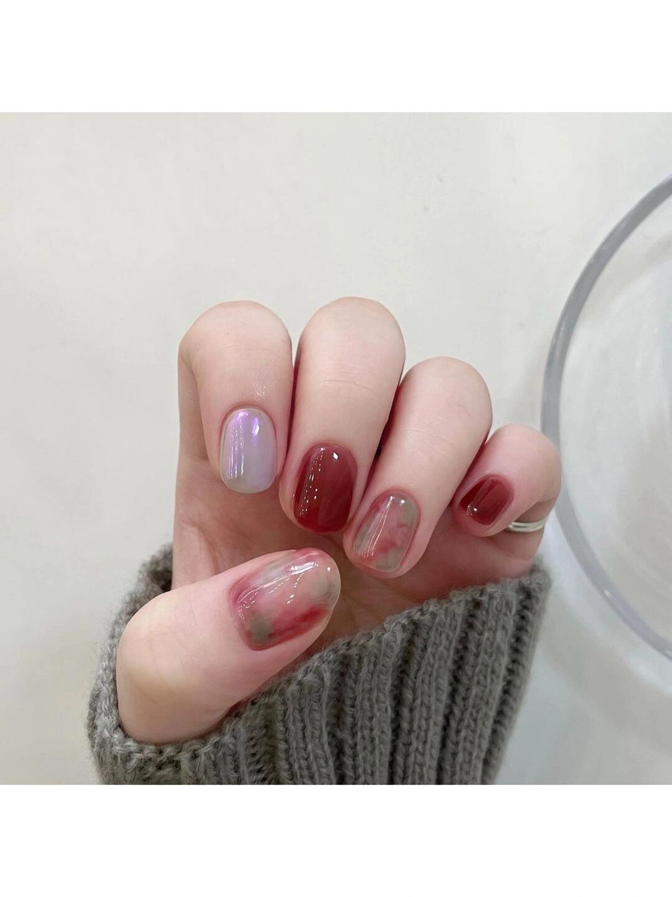 Purple and Burgundy Marble Short Round Nails shown as a nail art design with purple, burgundy, marble, elegant, round and short details.