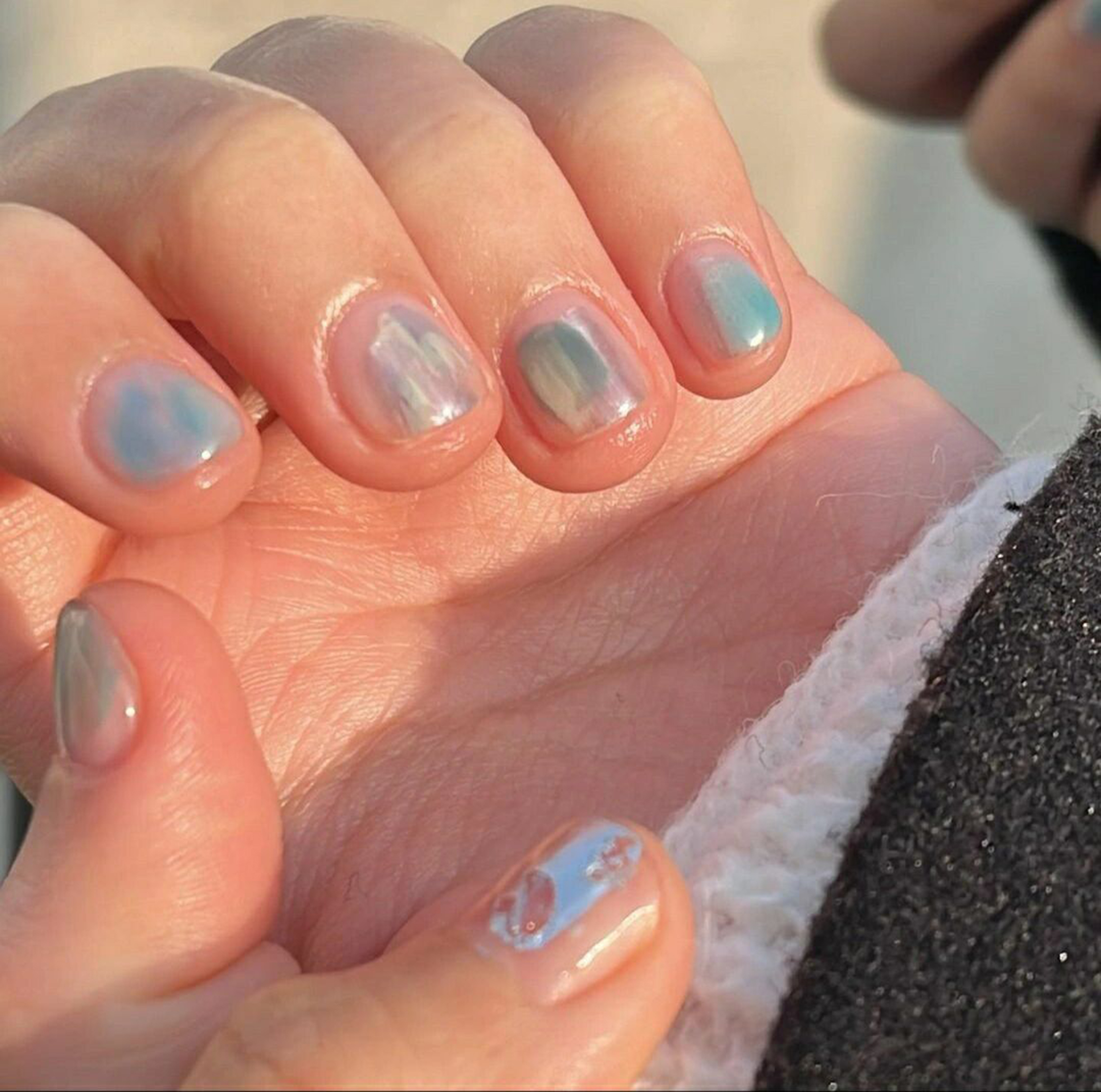Blue Chrome Short Nails shown as a nail art design with blue, chrome and short details.