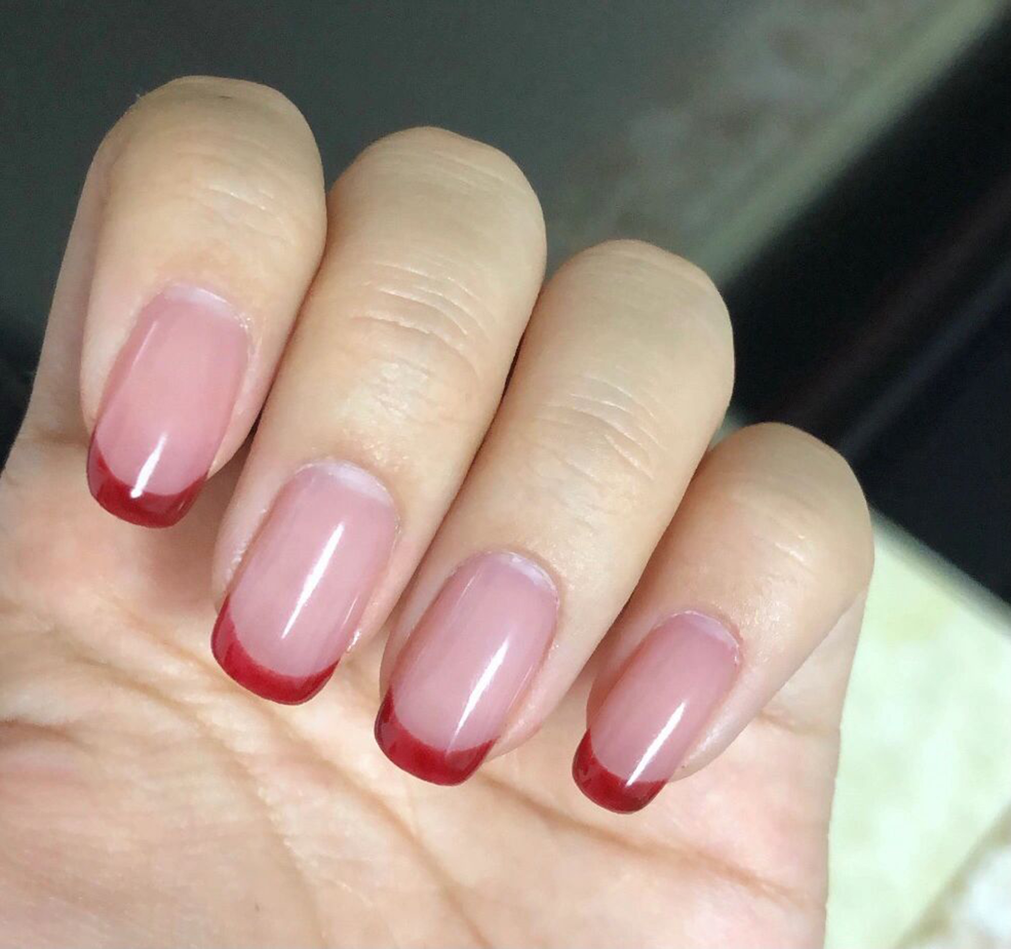 Red and Nude French Tip Square Nails shown as a nail art design with red, nude, french, square and medium details.