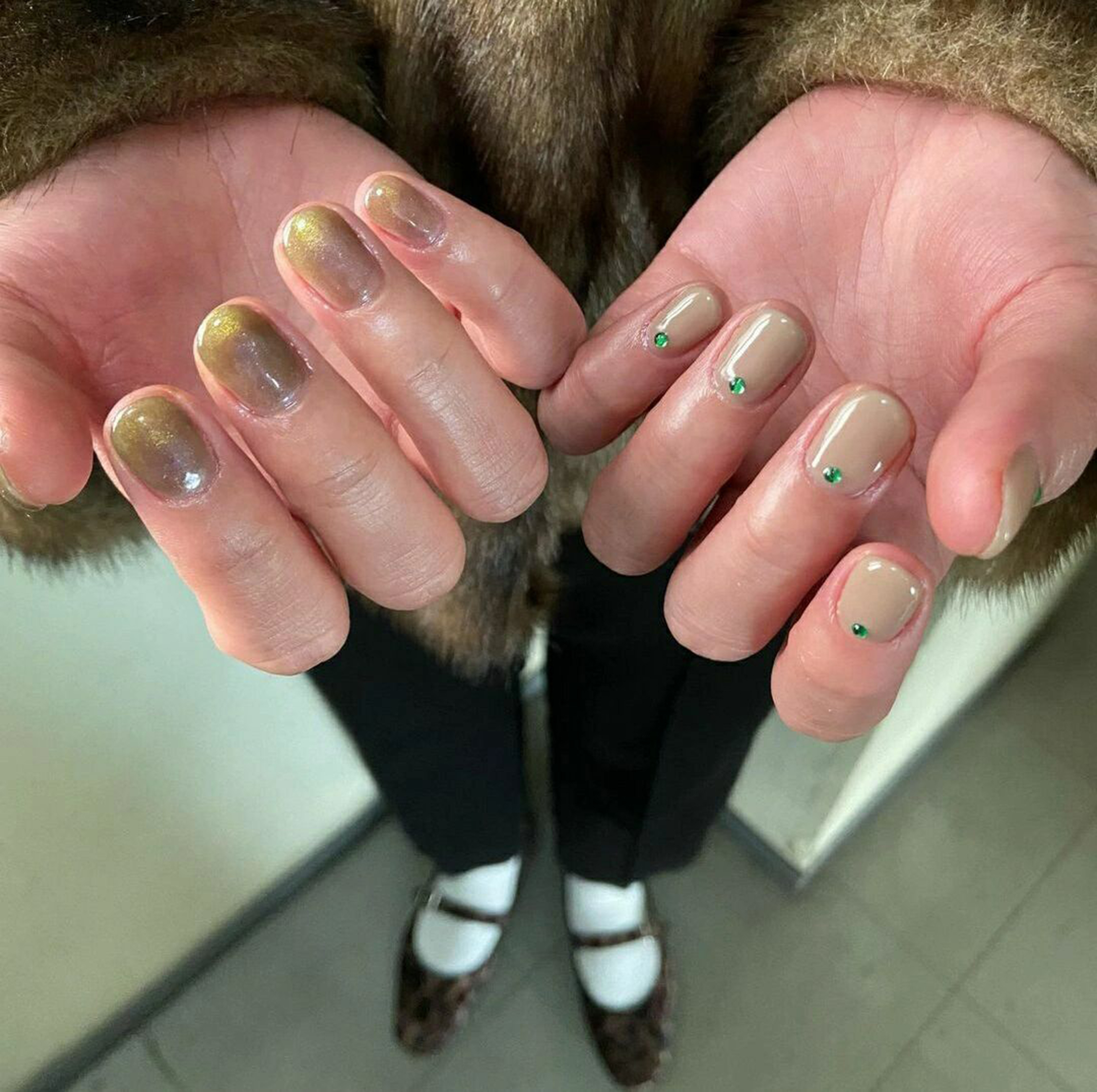 Nude, Green and Gold Cat Eye Short Round Nails shown as a nail art design with nude, green, gold, cat eye, round and short details.