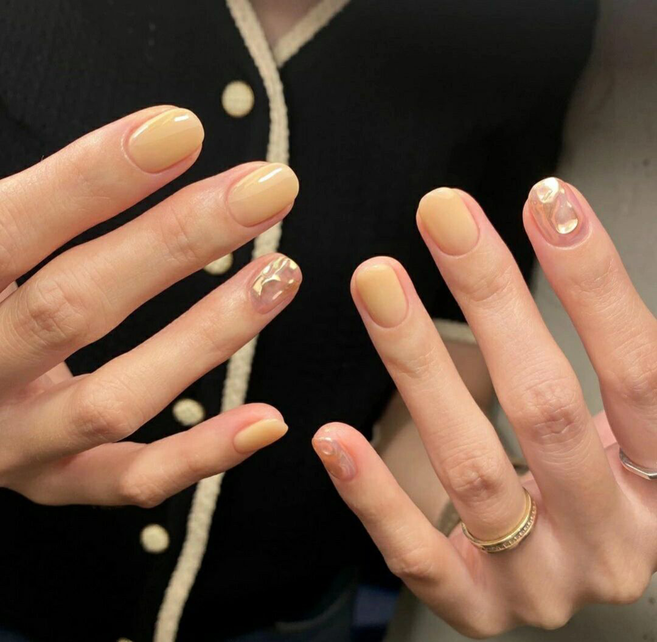 Butter Yellow Abstract Nails shown as a nail art design with butter yellow, elegant, marble, swirl, wave and medium details.