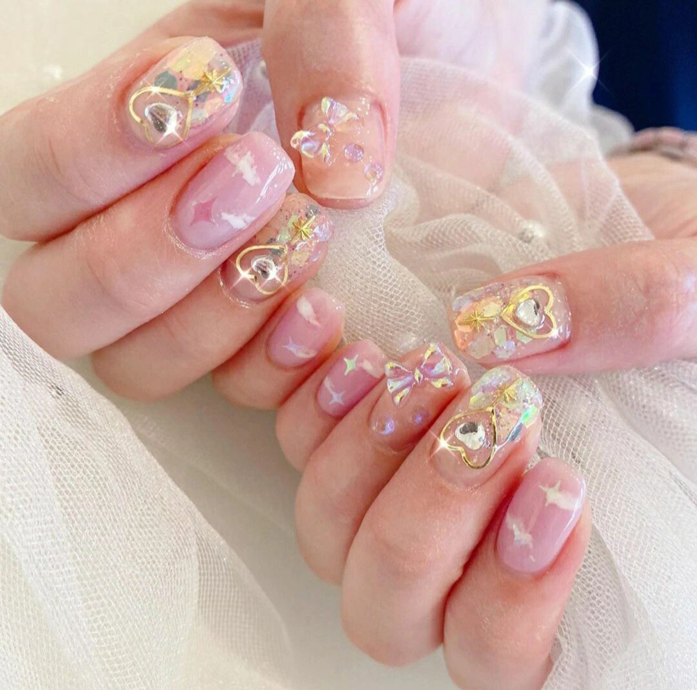 Pink and Gold Heart Square Nails shown as a nail art design with pink, gold, 3d, cute, heart, bow, square and medium details.